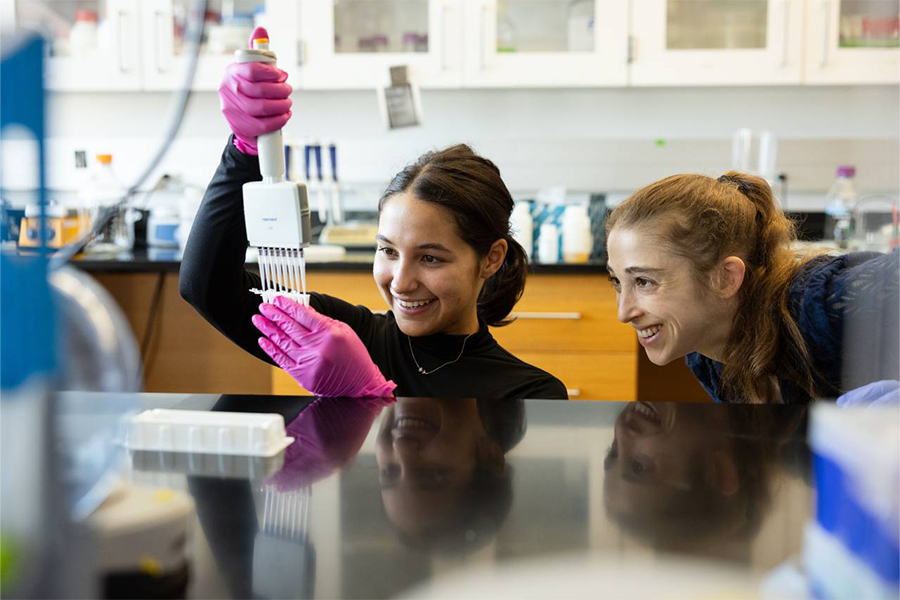 Chemistry professor Bri Bibel with student in lab